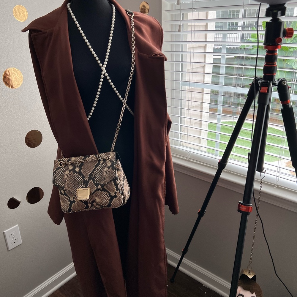 This beautiful brown jackets is a must have it’s used but in great condition